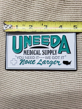 Load image into Gallery viewer, &quot;The Return of The Living Dead&quot; Movie Prop Replica, UNEEDA Medical Supply 2.5&quot; x 4.5&quot; Sign, BAM! Horror