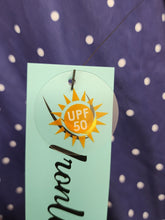 Load image into Gallery viewer, Ironwood hangtag showing UPF 50 sun protection badge